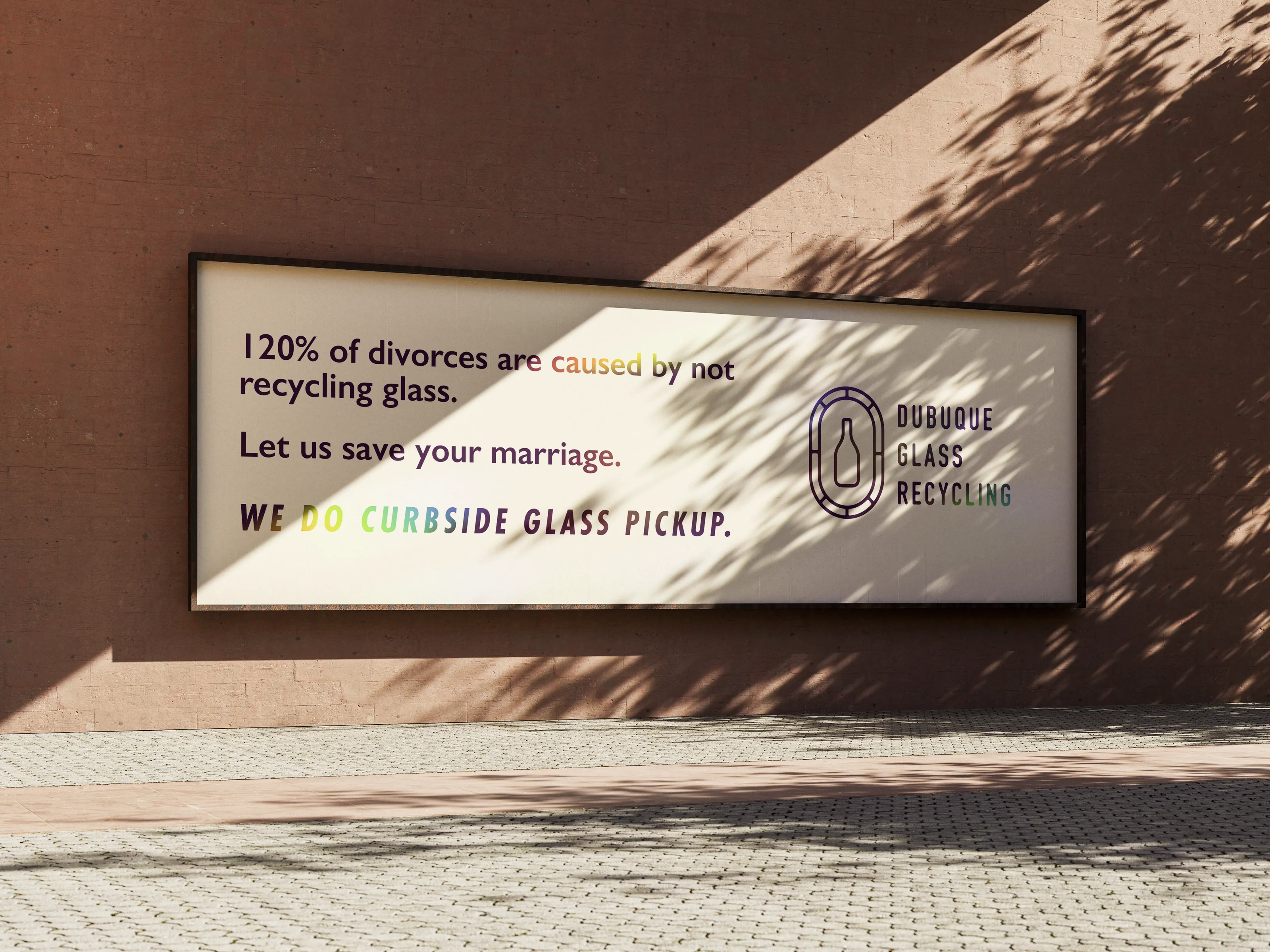 A billboard on a sunlit terracotta wall: &ldquo;120% of divorces are caused by not recycling glass. Let us save your marriage. We do curbside glass pickup.&rdquo;